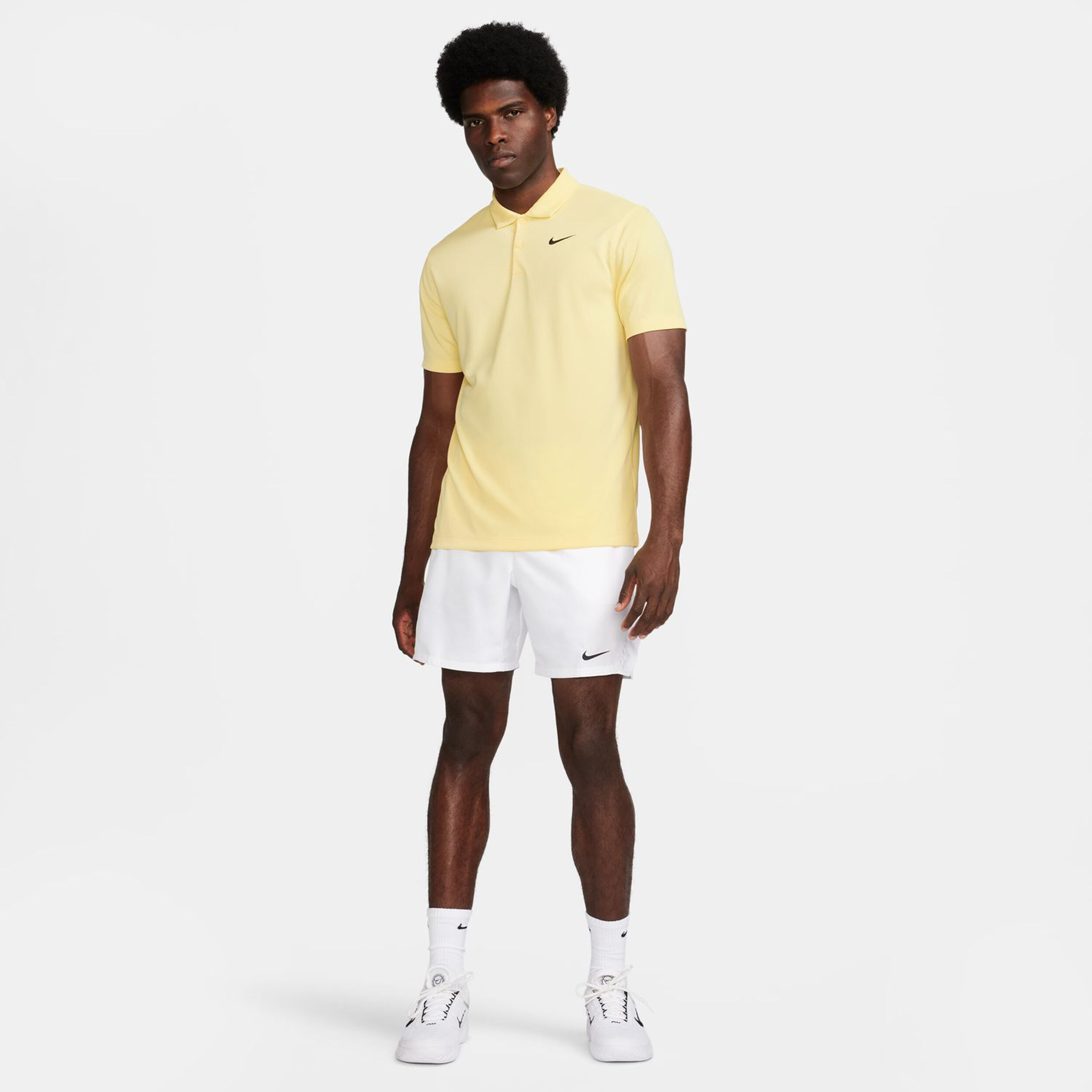 Yellow nike polo best sale