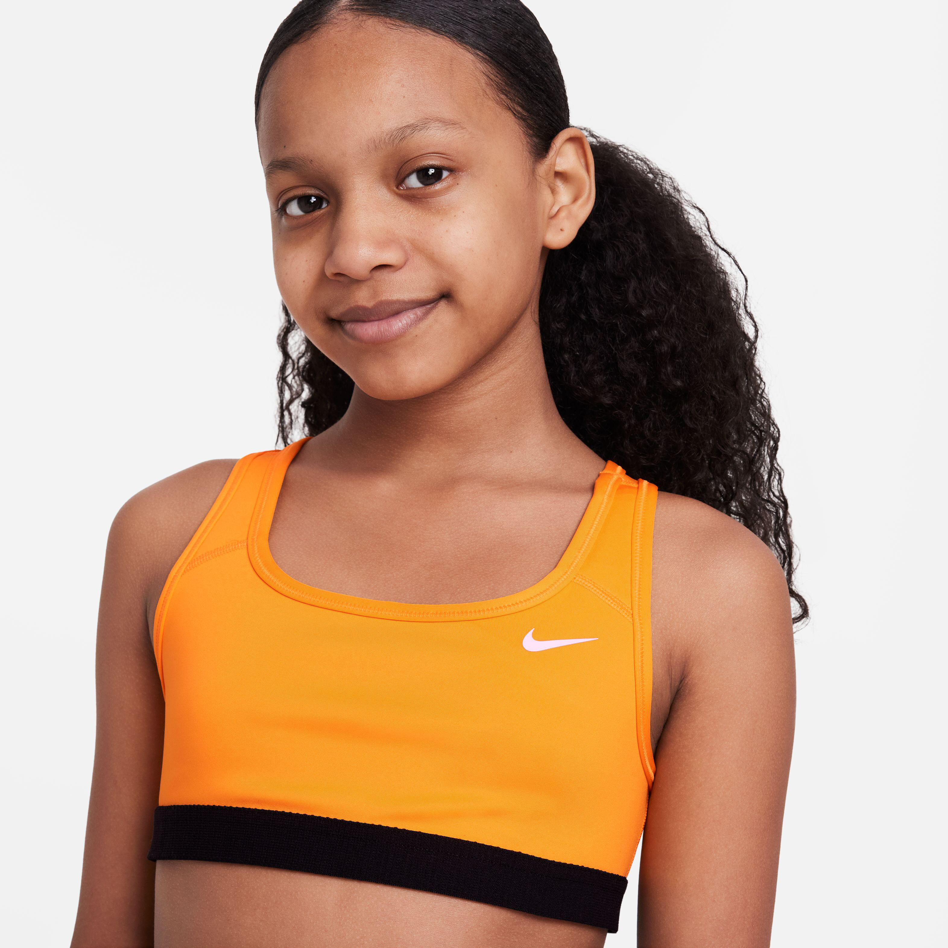 Girl in store sports bra
