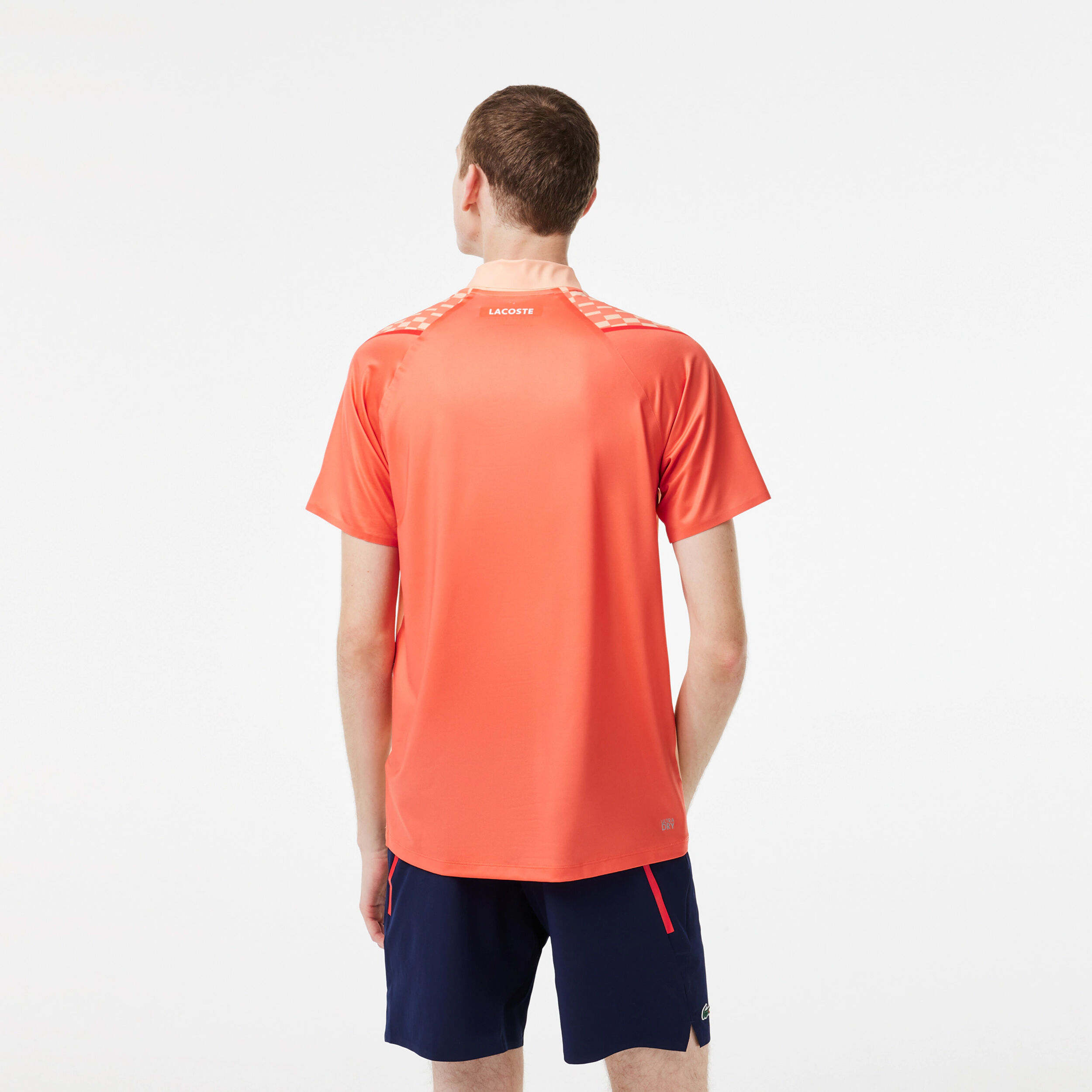 Short orange lacoste best sale