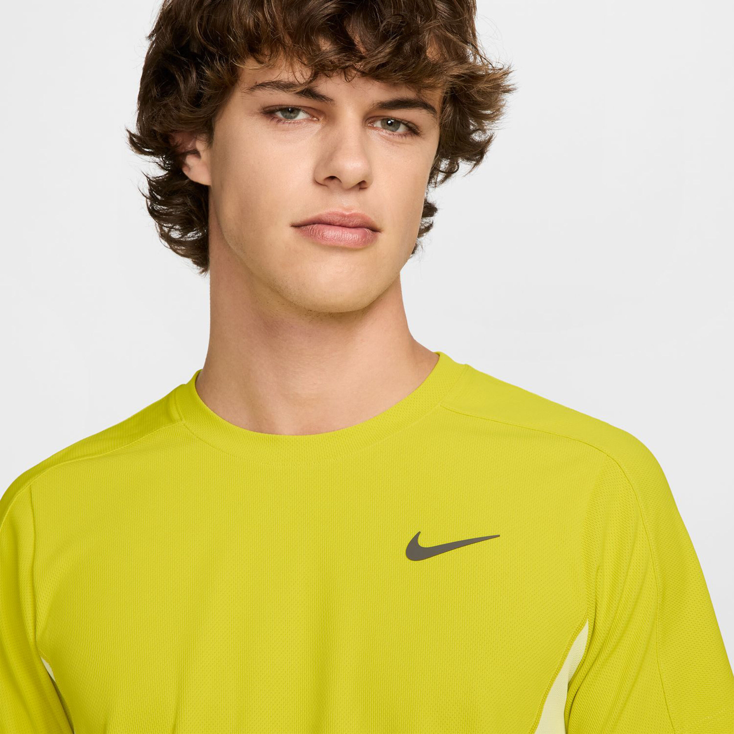 yellow nike tennis shirt