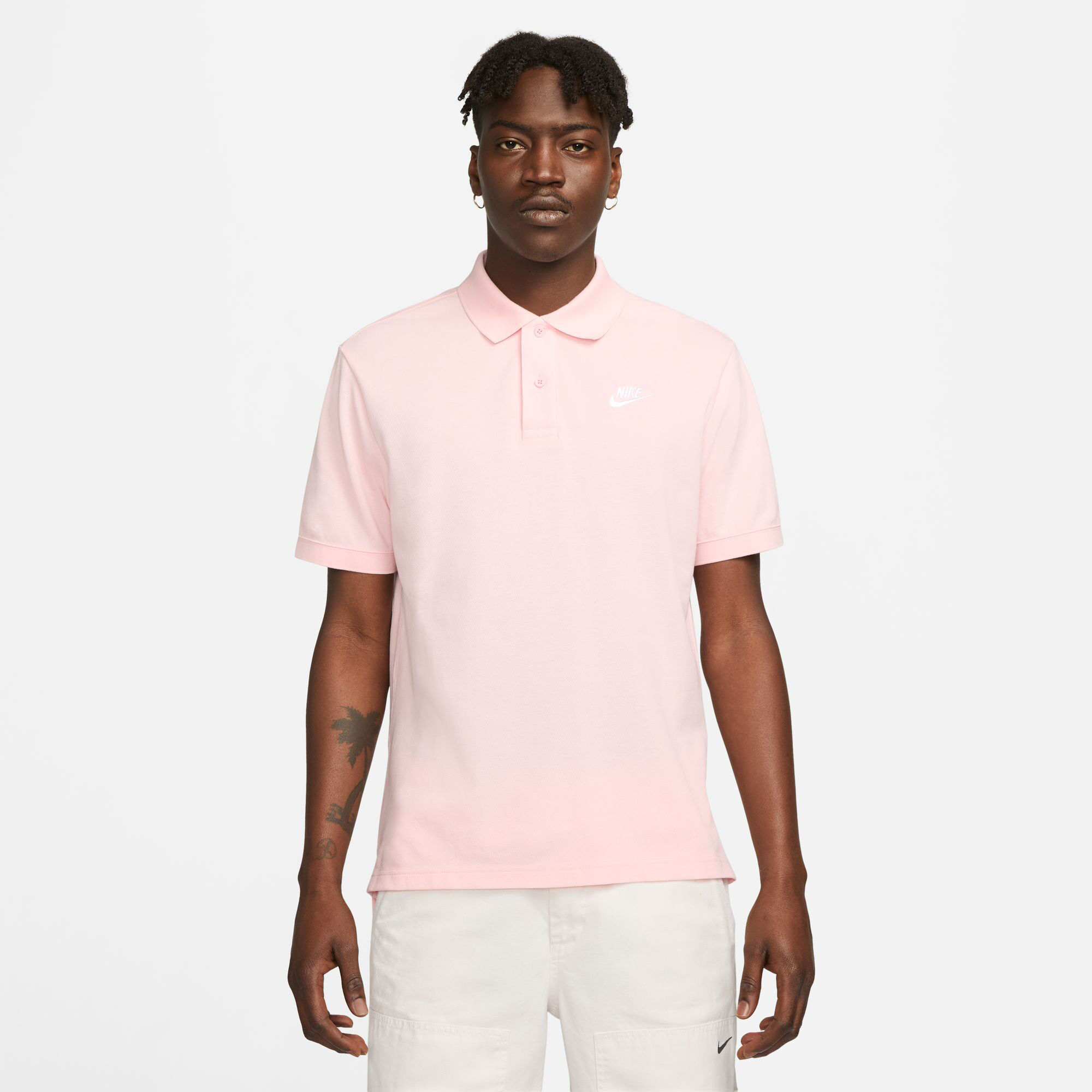 Pink nike polo sales