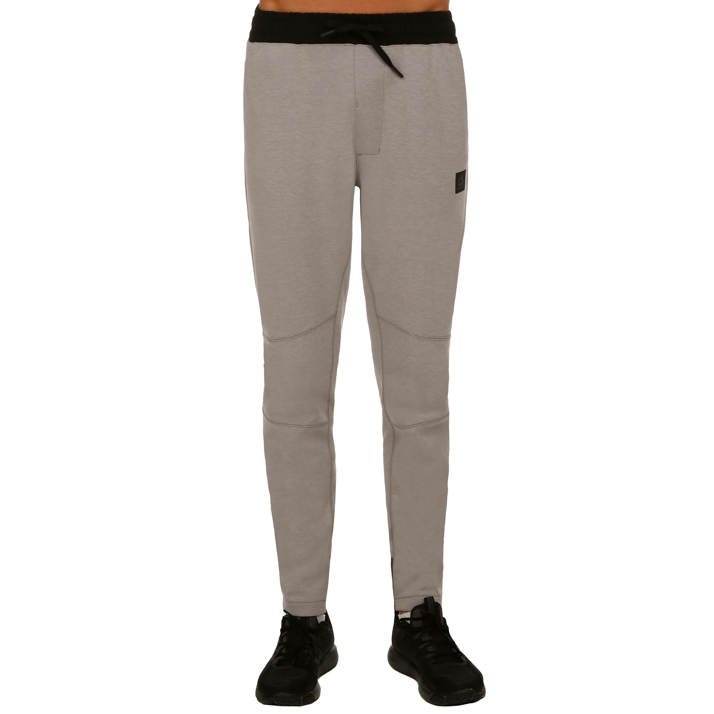 Reebok training supply joggers mens online