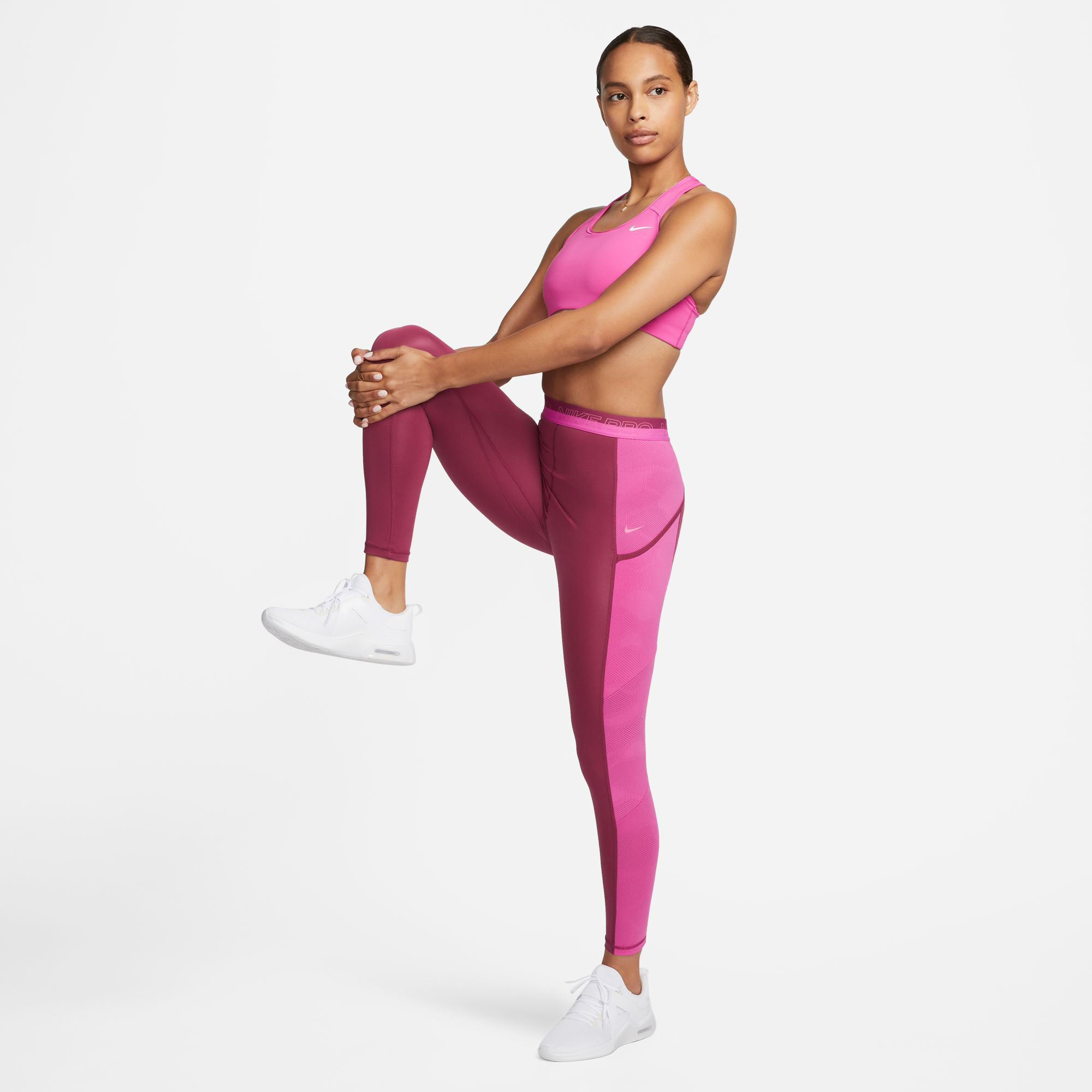 Pink best sale nike tights