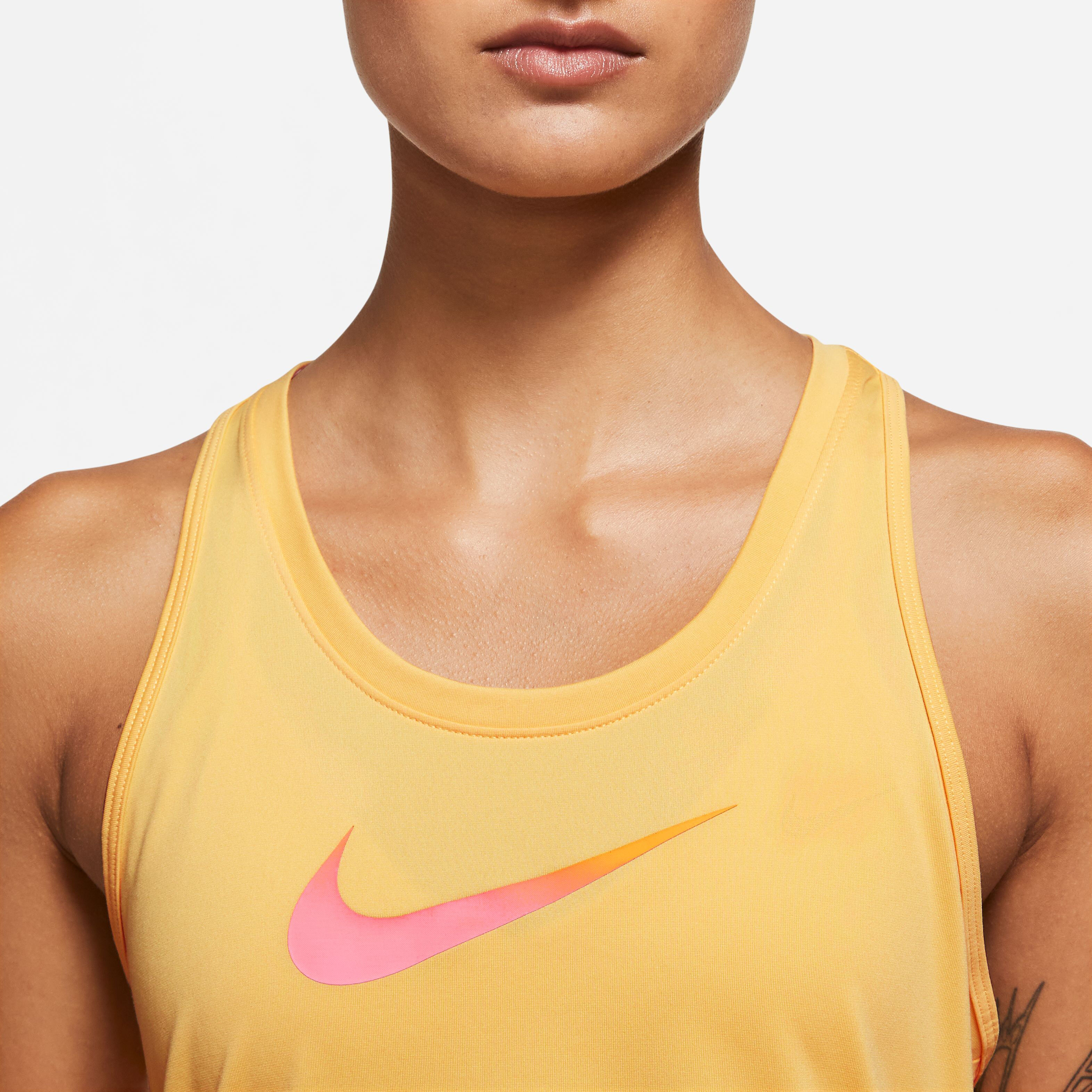 Nike women yellow top