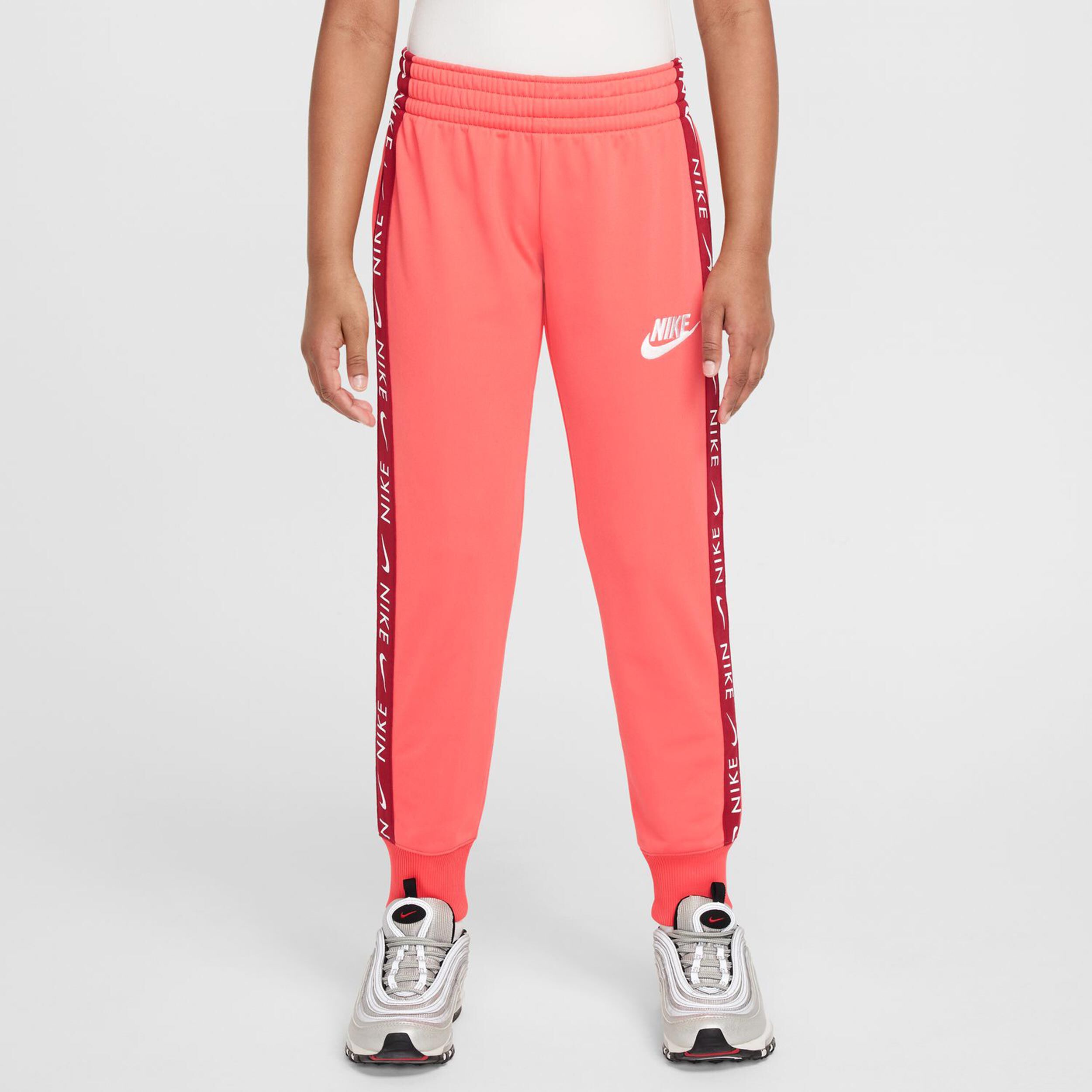 Buy Nike Tricot Tracksuit Girls Coral online Tennis Point UK