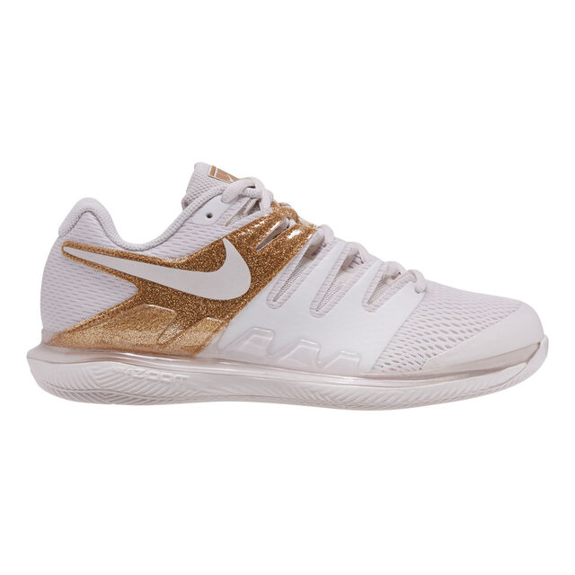 nike running escape run sneakers in white and gold